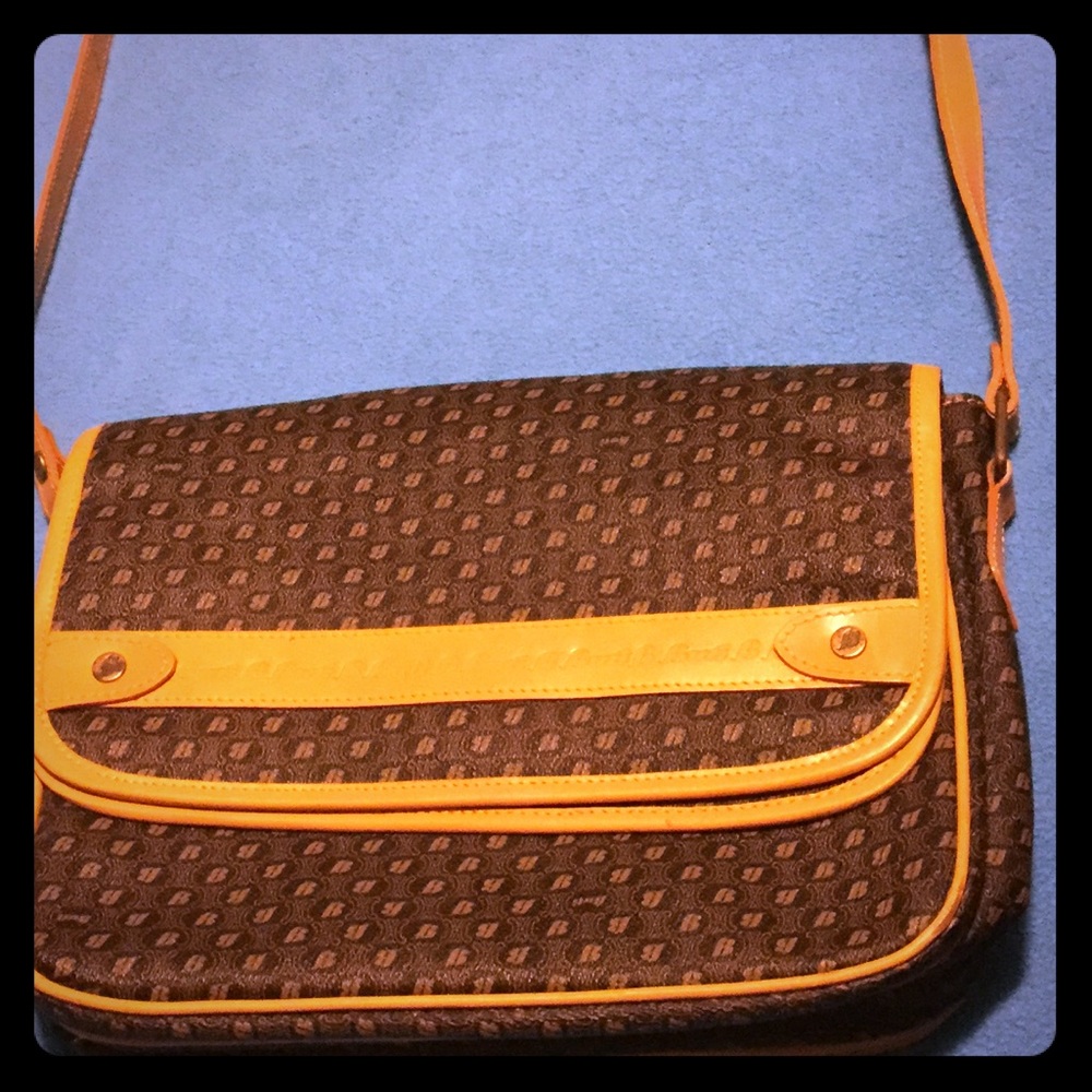 SOLD - Butti monogram cross over purse